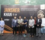 Nasir Iqbal receives the winning prize from the legend Jansher Khan